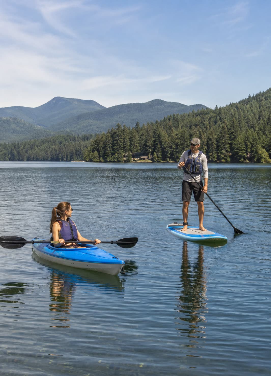 A paddler comparing recreational watercraft options